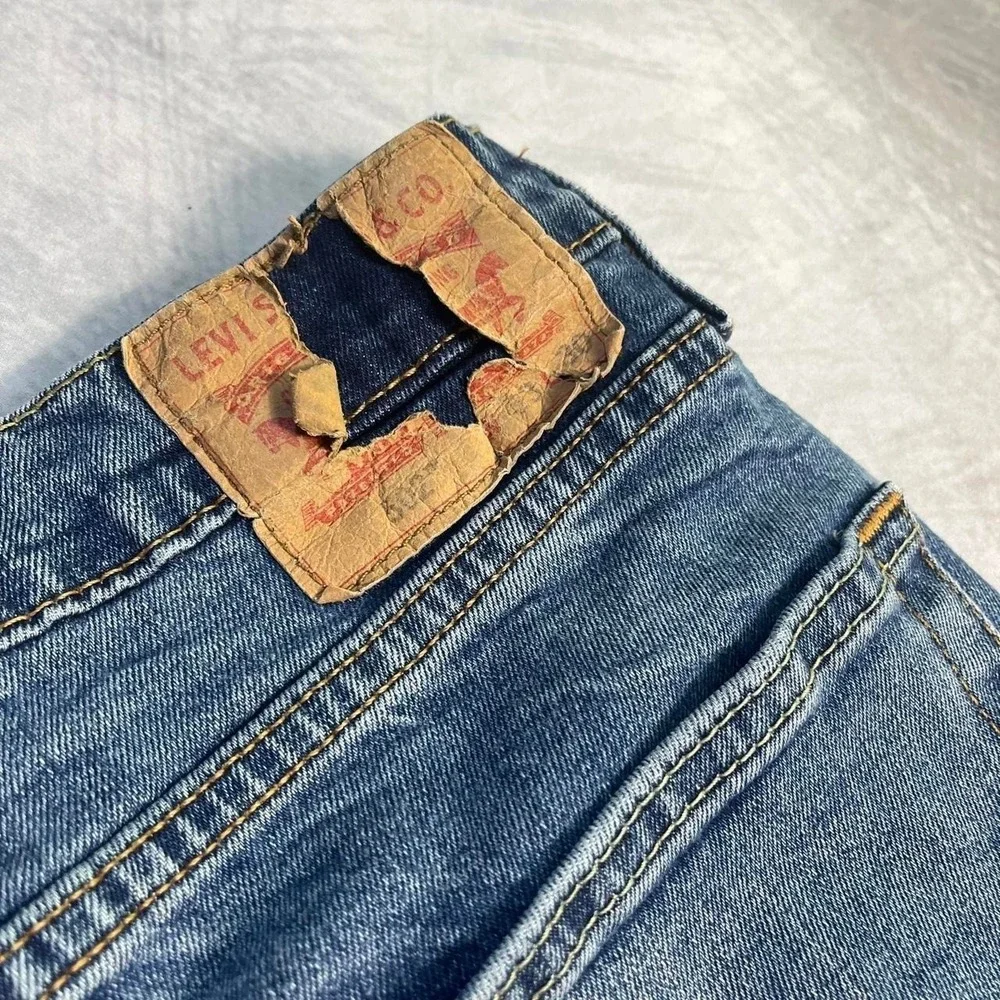 Levi's 502 Mid Wash Faded Denim Jeans